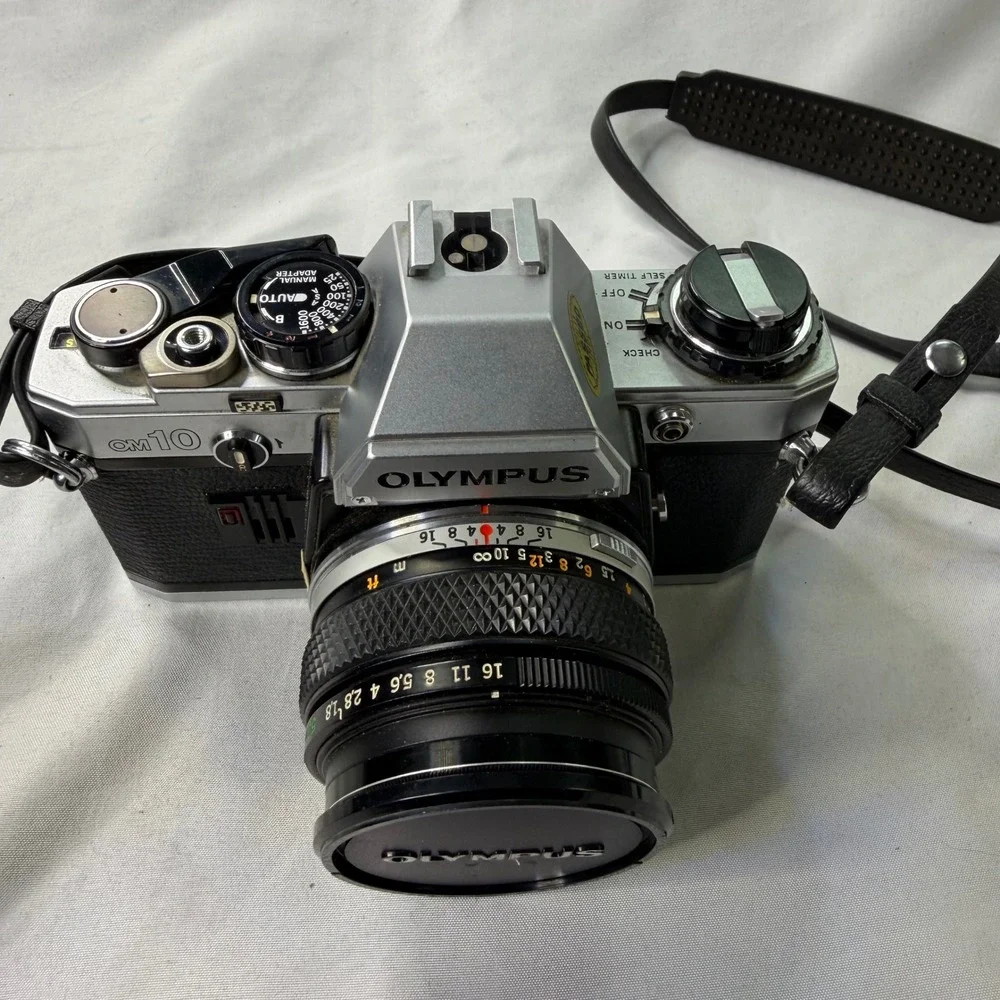 Olympus OM10 35mm Film SLR Camera with Zuiko 50mm f1.8 Lens and Case WORK TESTED